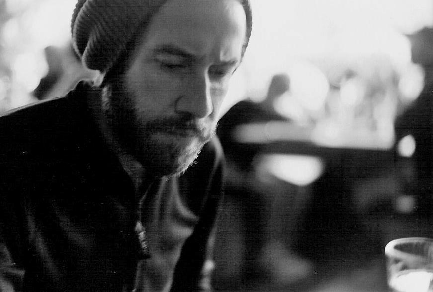 Loosening the pen by examining the drinks menu in Asheville